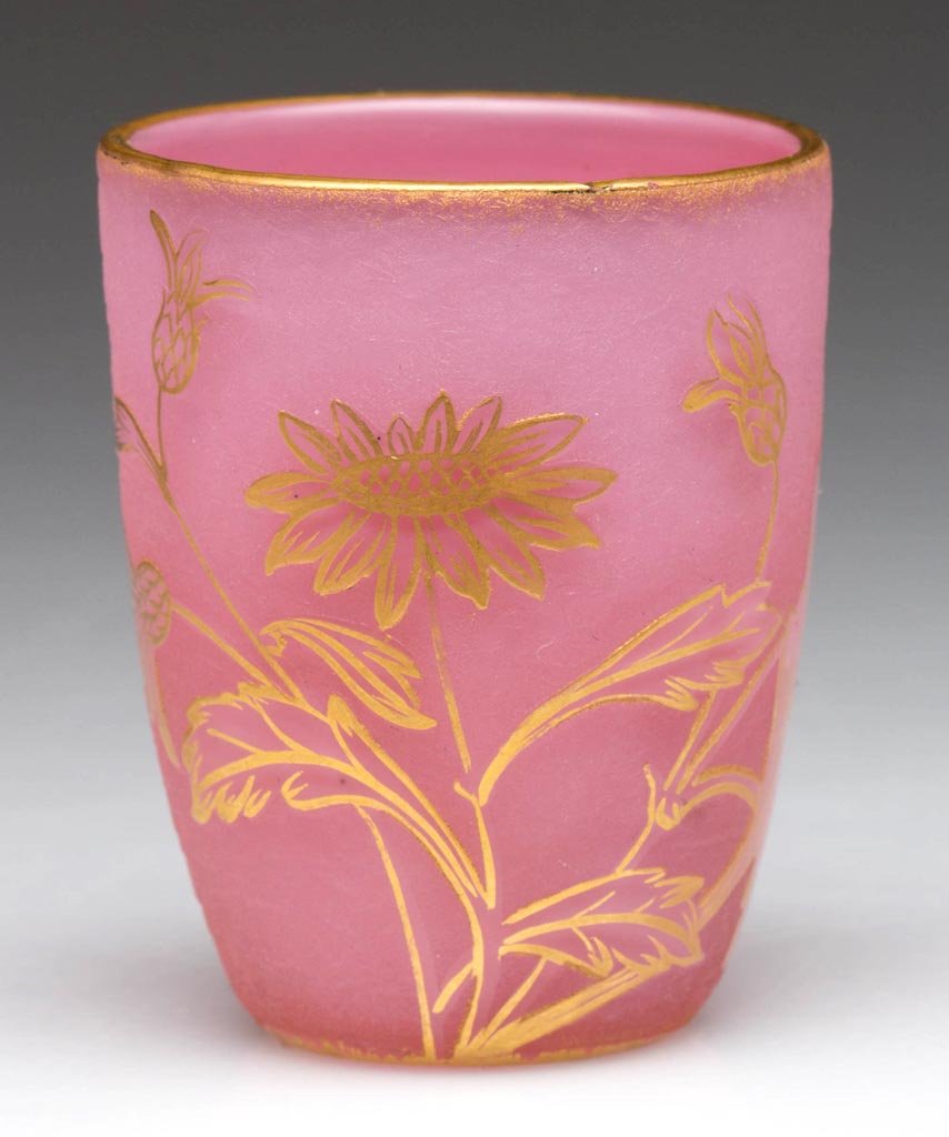 FRENCH DAUM NANCY CAMEO TOOTHPICK HOLDER: FRENCH DAUM NANCY CAMEO TOOTHPICK HOLDER, cased mottled rose, acid-cutback with flowers and leaves, with gilt decoration, base signed "Daum / (Cross of Lorraine) Nancy". Early 20th century. 2 1/8" H.