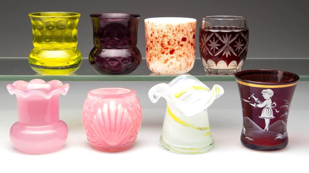 ASSORTED GLASS TOOTHPICK HOLDERS, LOT OF EIGHT: ASSORTED GLASS TOOTHPICK HOLDERS, LOT OF EIGHT, various colors, including a cased pink Shell and Seaweed, five with factory polished rims and one with a polished pontil mark. 20th century. 2 1/8" to 2