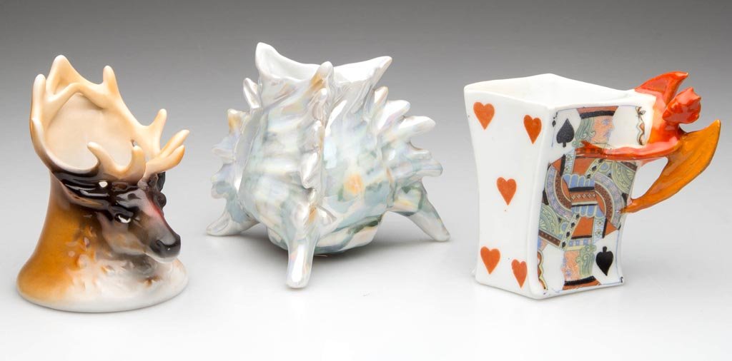 ROYAL BAYREUTH PORCELAIN TOOTHPICK HOLDERS, LOT OF: ROYAL BAYREUTH PORCELAIN TOOTHPICK HOLDERS, LOT OF THREE, novelty figural examples, including a luster-glazed shell-form example; an example shaped like an elk's head; and a devil-handled, diamond-for