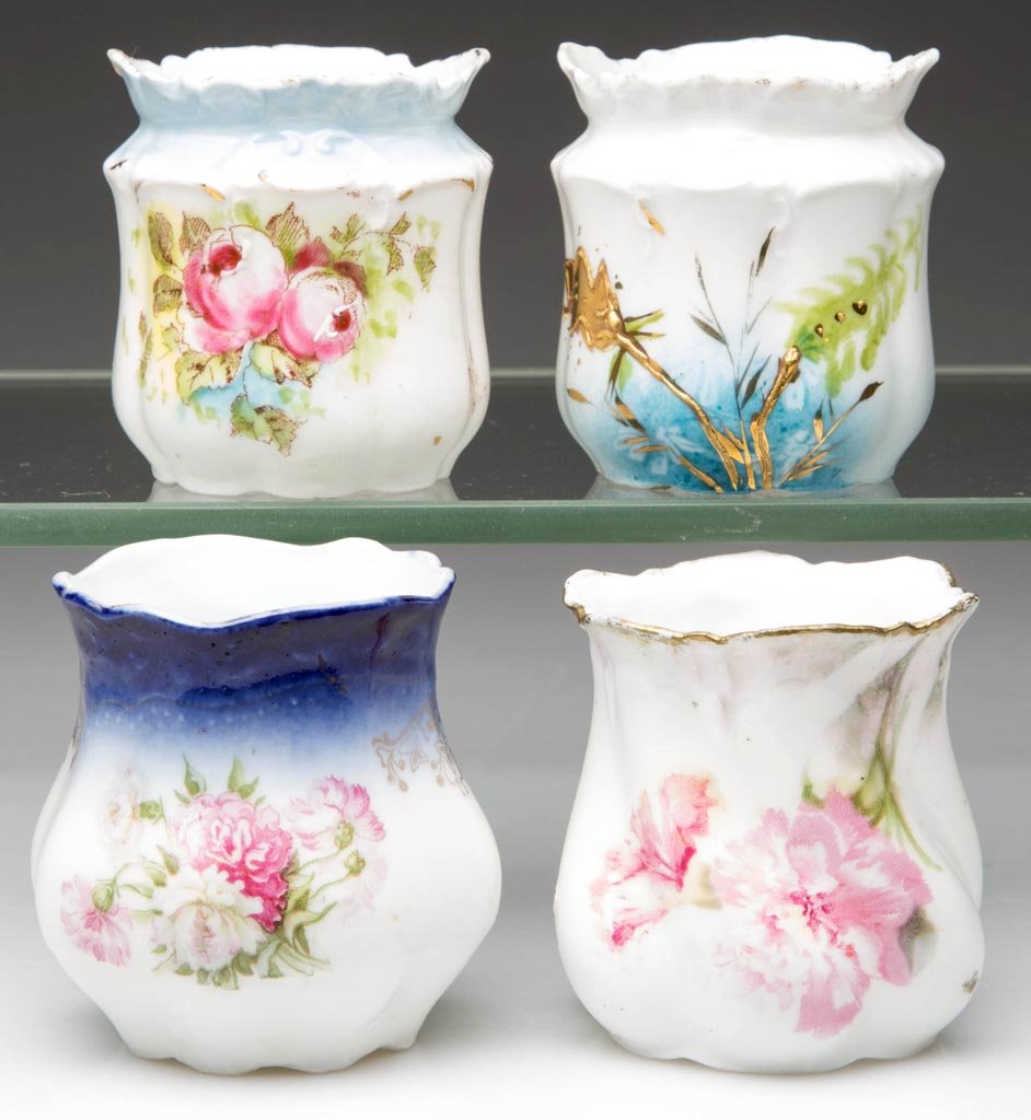 R. S. PRUSSIA AND CONTINENTAL PORCELAIN TOOTHPICK: R. S. PRUSSIA AND CONTINENTAL PORCELAIN TOOTHPICK HOLDERS, LOT OF FOUR, of low lobed form and scalloped rims, two with lightly worn gilt and floral decoration and impressed star to underside, the othe