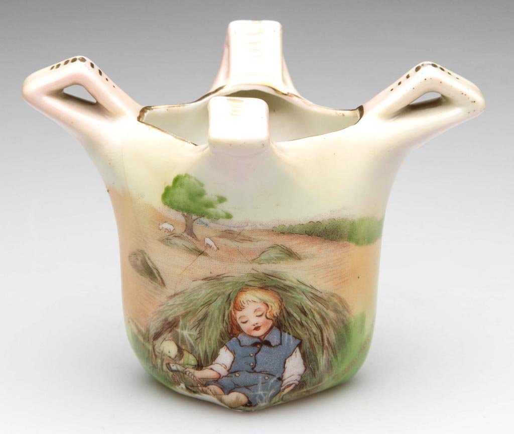 ROYAL BAYREUTH PORCELAIN TOOTHPICK HOLDER: ROYAL BAYREUTH PORCELAIN TOOTHPICK HOLDER, of unusual form, with four flattened handles above the rounded square body, painted with the "Little Boy Blue" pattern, marked in blue to underside. Circa 19