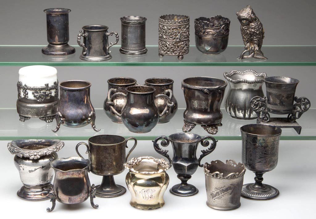 ASSORTED SILVER-PLATE TOOTHPICK HOLDERS, LOT OF 18: ASSORTED SILVER-PLATE TOOTHPICK HOLDERS, LOT OF 18, markings include Wilcox, Barbour, and Southington. Together with an owl figure without holder. Nineteen (19) pieces total. Fourth quarter 19th/first