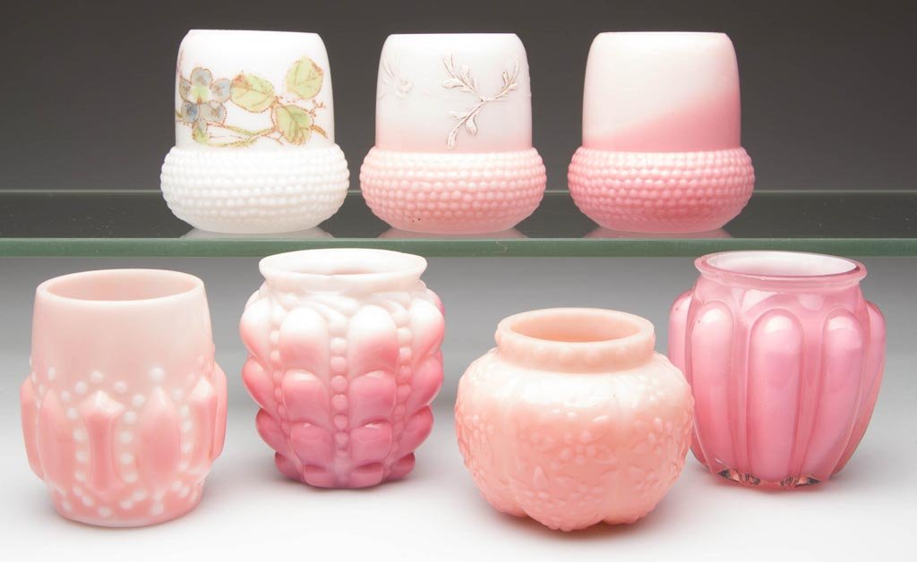 ASSORTED OPAQUE GLASS TOOTHPICK HOLDERS, LOT OF SEVEN: ASSORTED OPAQUE GLASS TOOTHPICK HOLDERS, LOT OF SEVEN, pink and opal, including a Challinor's Forget-Me-Not. Fourth quarter 19th/first quarter 20th century. 2 1/8" to 2 1/2" H. Provenance: From the co