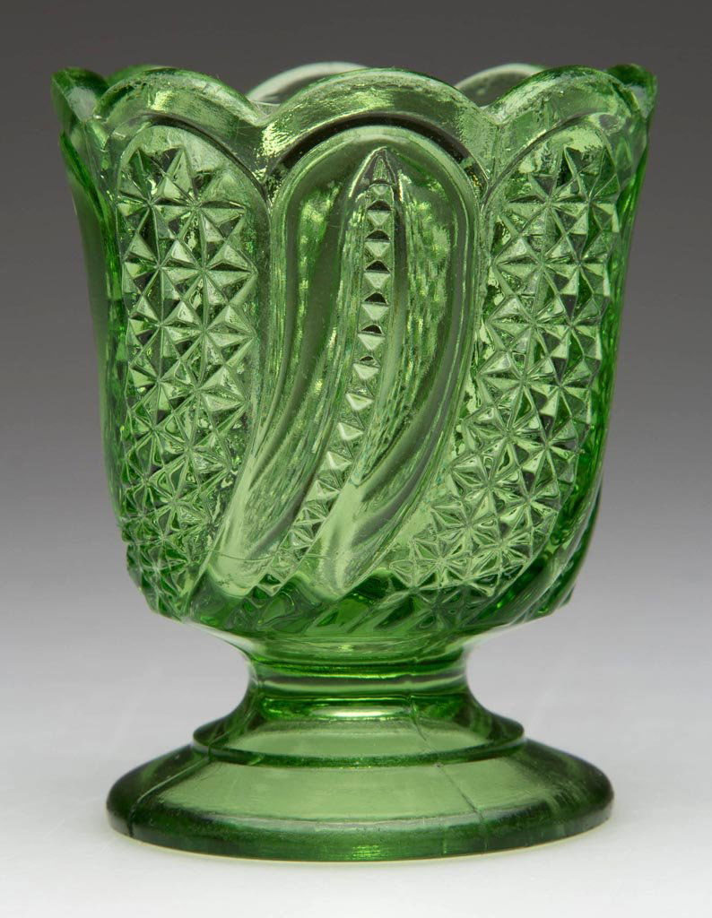 FEATHER / DORIC TOOTHPICK HOLDER: FEATHER / DORIC TOOTHPICK HOLDER, green. McKee & Brothers. Circa 1896. 2 3/4" H. Provenance: From the collection of Betty and Jim MaGuire.