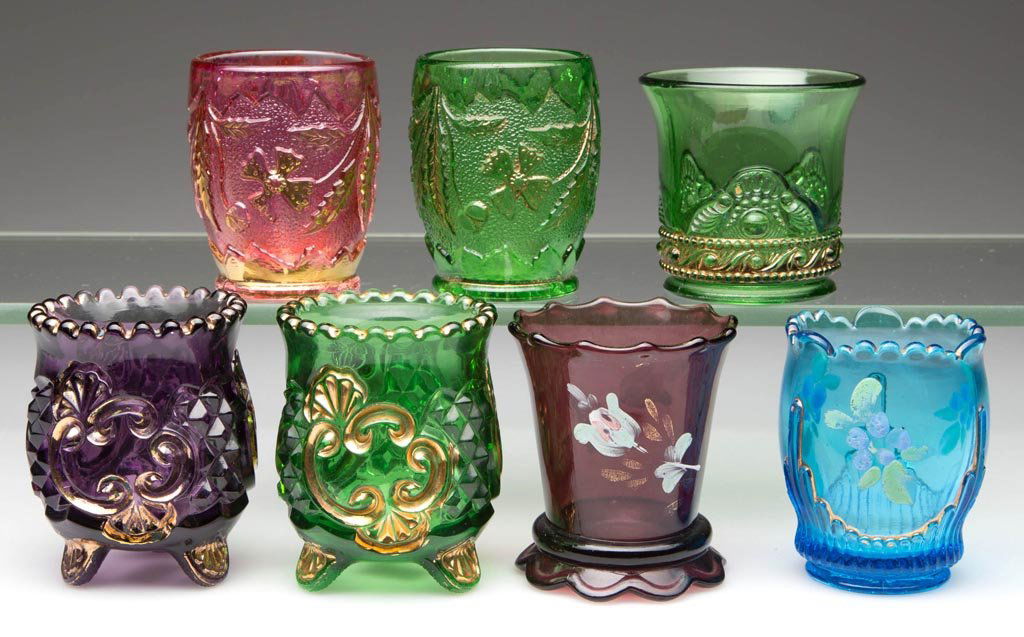 ASSORTED EAPG TOOTHPICK HOLDERS, LOT OF SEVEN: ASSORTED EAPG TOOTHPICK HOLDERS, LOT OF SEVEN, various colors, including two Croesus and two Delaware. Late 19th/first quarter 20th century. 2 1/4" to 2 3/4" H. Provenance: Collection of Lyle and Dori