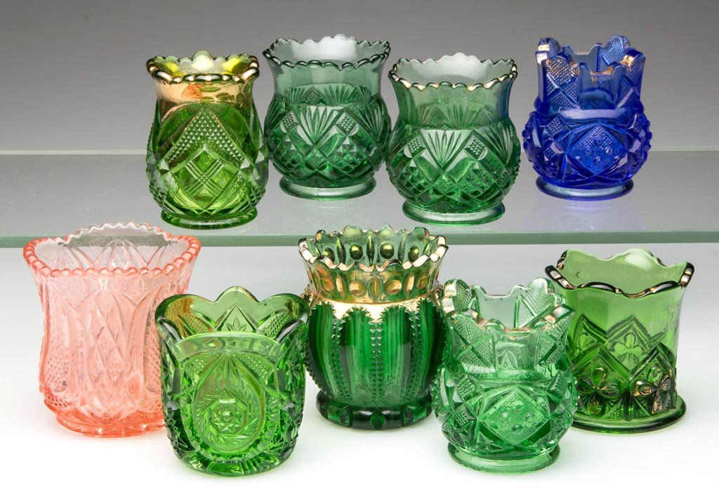 ASSORTED COLORED EAPG TOOTHPICK HOLDERS, LOT OF EIGHT: ASSORTED COLORED EAPG TOOTHPICK HOLDERS, LOT OF EIGHT, green, blue, and pink, seven with gilt decoration, including two Champion and a Prize. Late 19th/early 20th century. 2 1/4" to 2 3/4" H. Provenan