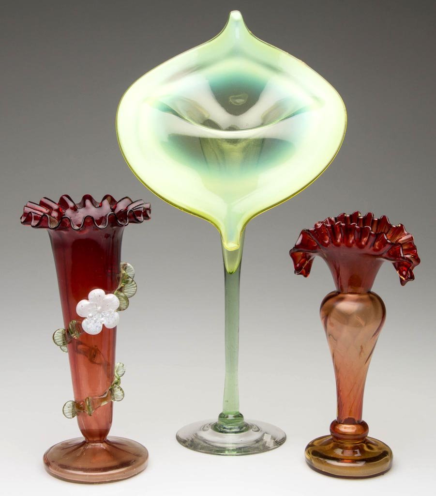 ASSORTED VICTORIAN GLASS VASES, LOT OF THREE: ASSORTED VICTORIAN GLASS VASES, LOT OF THREE, comprising a light green opalescent Jack-in-the-Pulpit example, an amberina Swirled Rib-Optic, and a shaded cranberry Rib-Optic with applied rigaree and f