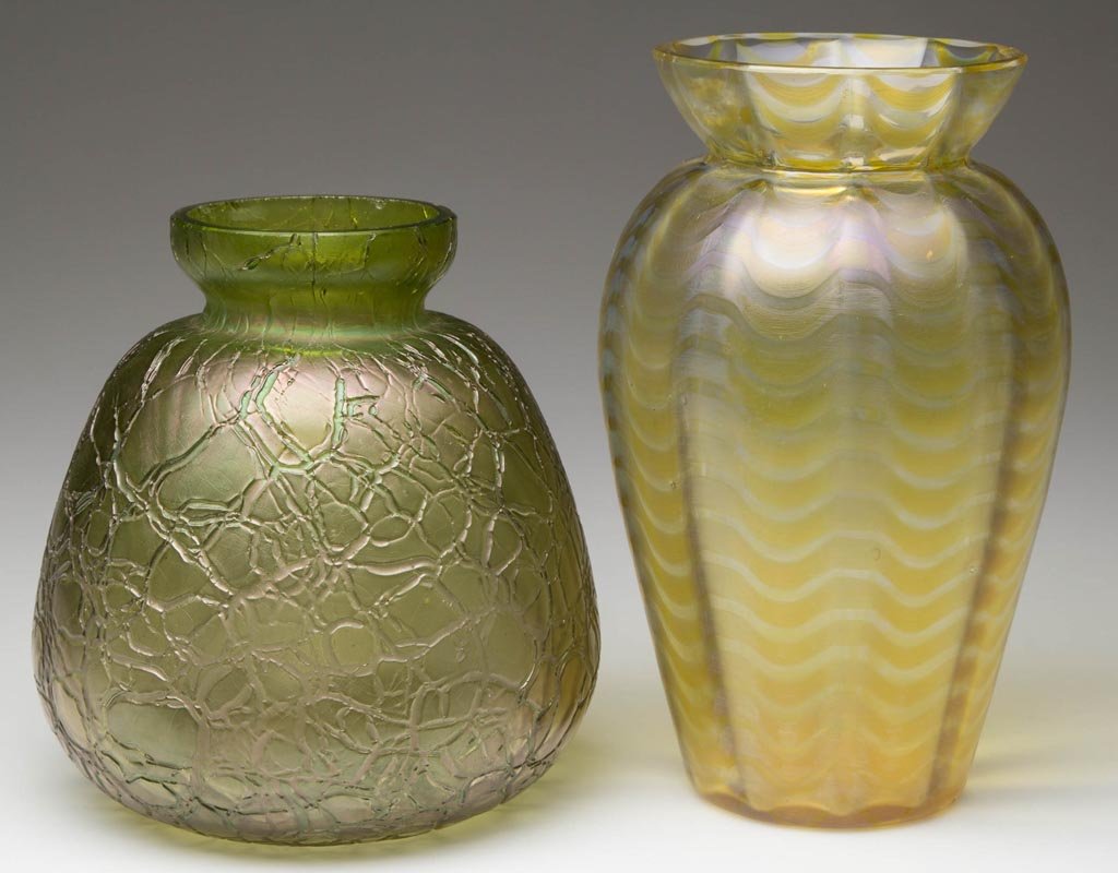 LOETZ-TYPE BOHEMIAN VASES, LOT OF TWO: LOETZ-TYPE BOHEMIAN VASES, LOT OF TWO, iridescent, comprising a crete craquele-surface example and a gold wave example, each with factory polished rim. Circa 1900. 5 1/4" and 6 3/4" H.