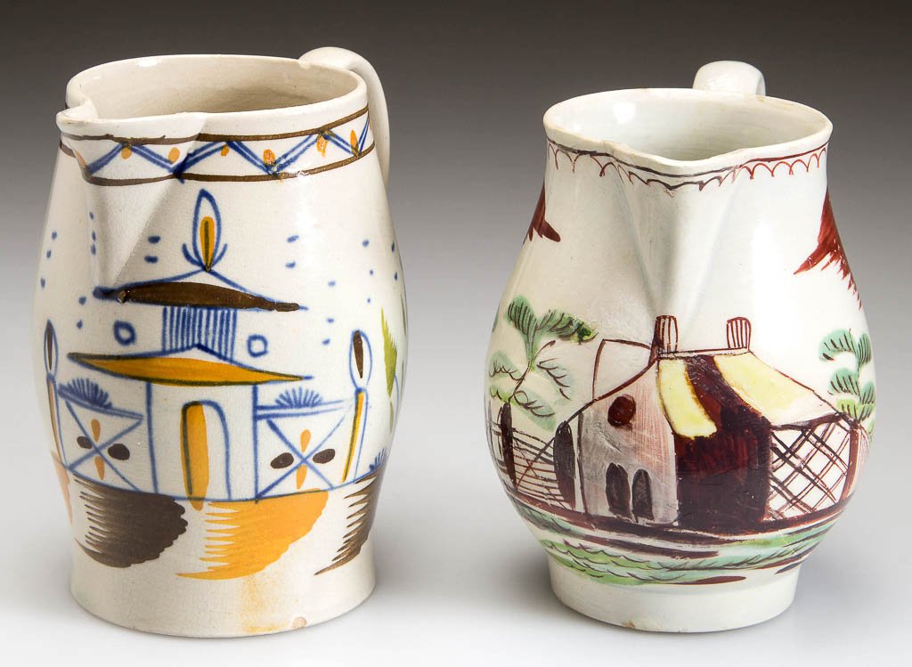 ENGLISH STAFFORDSHIRE POTTERY PEARLWARE DIMINUTIVE: ENGLISH STAFFORDSHIRE POTTERY PEARLWARE DIMINUTIVE CIDER JUG AND PITCHER, the first of typical baluster form, painted with Chinoiserie pavilions and shrubbery, under a border of blue and ocher dots an
