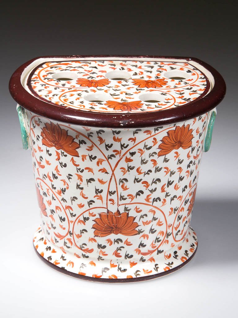 DAVENPORT STAFFORDSHIRE POTTERY PEARLWARE BOUGH POT AND: DAVENPORT STAFFORDSHIRE POTTERY PEARLWARE BOUGH POT AND COVER, of tapering D-form, with molded ring handles to the sides; the pierced cover fitted into the flange on the top; with deep brown-red rims