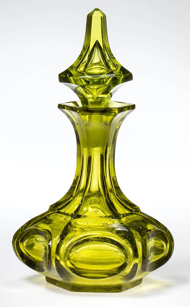 PRESSED PANELED HORIZONTAL OVALS COLOGNE BOTTLE: PRESSED PANELED HORIZONTAL OVALS COLOGNE BOTTLE, bright yellow olive-green, hexagonal form with panel-cut neck, factory polished mouth, table ring and pontil mark, appropriate hexagonal teared stopper