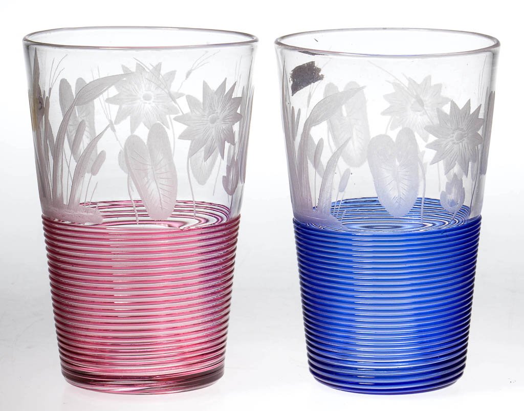 SANDWICH THREADED AND ENGRAVED SARSAPARILLA GLASSES,: SANDWICH THREADED AND ENGRAVED SARSAPARILLA GLASSES, LOT OF TWO, colorless with blue and red threading, each with Pond Lilies and Cattails decoration and polished pontil mark. Boston & Sandwich Glass 