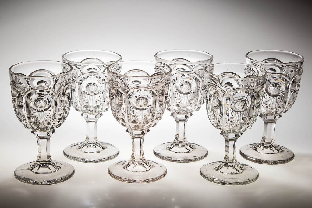 BULL'S EYE WITH FLEUR DE LYS GOBLETS, LOT OF SIX: BULL'S EYE WITH FLEUR DE LYS GOBLETS, LOT OF SIX, colorless lead glass. Third quarter 19th century. 6 1/4" to 6 1/2" H. Provenance: Collection of the late Lois S. Hirschmann, Marion, MA.