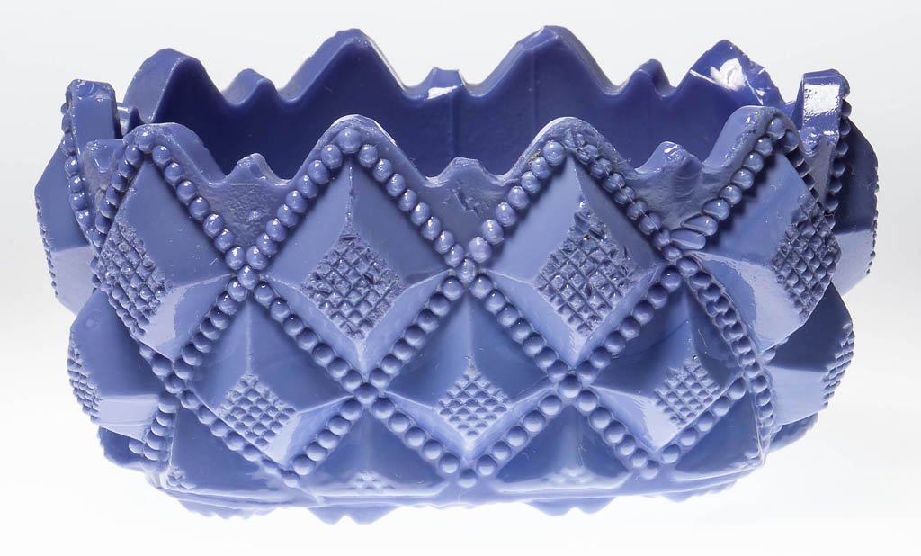 OL-15 BEADED STRAWBERRY DIAMOND OVAL PRESSED OPEN SALT: OL-15 BEADED STRAWBERRY DIAMOND OVAL PRESSED OPEN SALT, opaque light violet blue with some interior mottling, high and low point rim. Very rare. Boston & Sandwich Glass Co. Circa 1830-1850. 1 3/4" H,