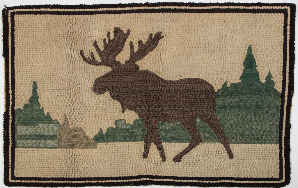 VIRGINIA PICTORIAL HOOKED RUG: VIRGINIA PICTORIAL HOOKED RUG, depicting a large moose before a stylistic landscape of trees, three-part border. Made by Verda Hershberger Brenneman (1903-1991), Denbigh, Warwick Co., Virginia. Circa 
