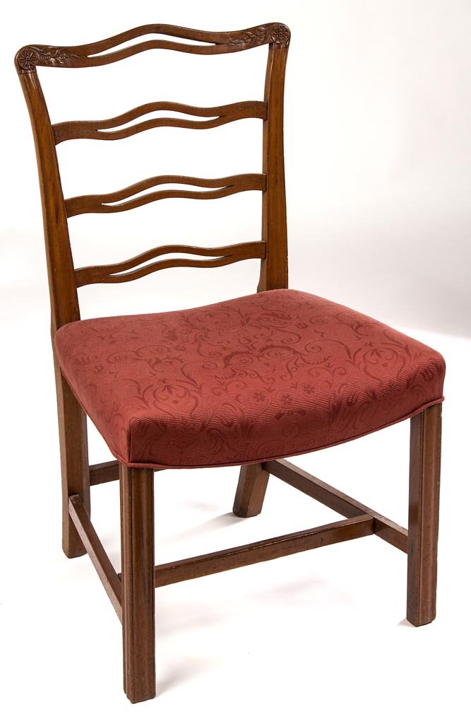 MARYLAND CHIPPENDALE MAHOGANY SIDE CHAIR: MARYLAND CHIPPENDALE MAHOGANY SIDE CHAIR, the ribbon-back form with carved rosettes on ears and trailing leaf-and-berry elements to corners of crest rail over a wide trapezoidal seat frame and raised