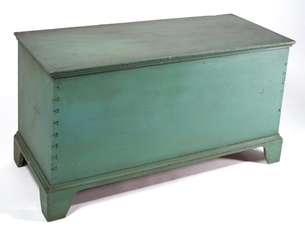 ALBEMARLE COUNTY, VIRGINIA PAINTED POPLAR BLANKET CHEST: ALBEMARLE COUNTY, VIRGINIA PAINTED POPLAR BLANKET CHEST, the rectangular one-board top with applied ogee molding over a dovetailed case, raised on an applied cut-out bracket base with shaped feet supp