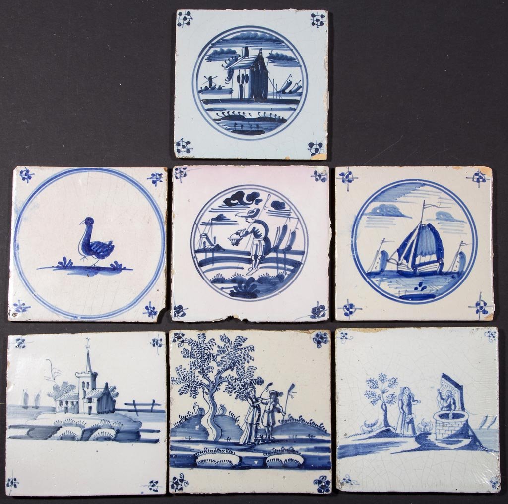 DUTCH AND ENGLISH DELFT POTTERY SQUARE TILES, LOT OF: DUTCH AND ENGLISH DELFT POTTERY SQUARE TILES, LOT OF SEVEN, each painted in blue with various subject matter including stylized flower heads in the corners; one Biblical topic of "Rebecca at the Well"