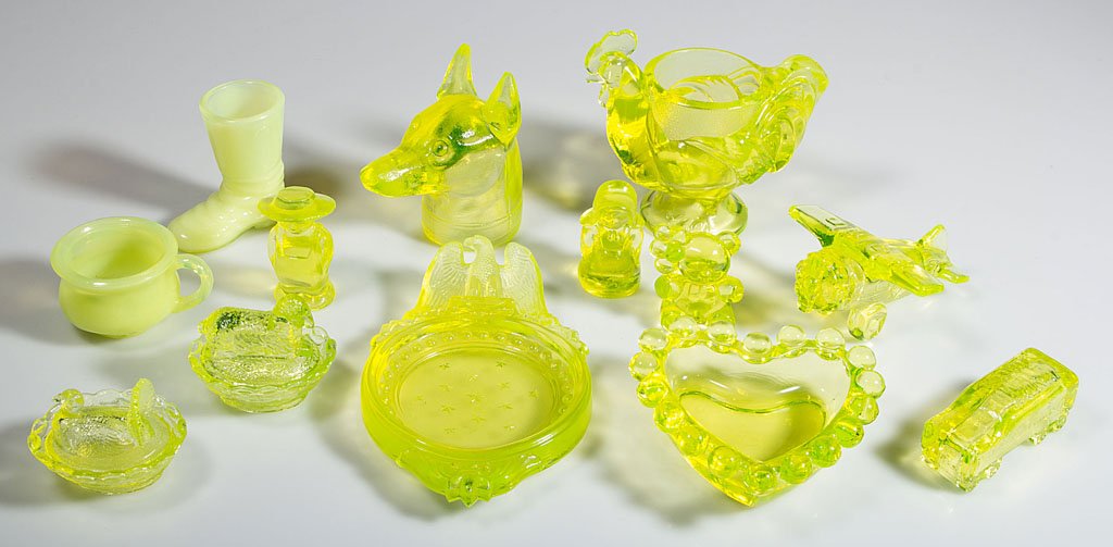 CONTEMPORARY PRESSED GLASS NOVELTIES, LOT OF 13: CONTEMPORARY PRESSED GLASS NOVELTIES, LOT OF 13, vaseline (uranium), two with opalescence, each marked for the Boyd Glass Co. Second half 20th century. 4 1/4" HOA. Provenance: Collection of Barbara Fr