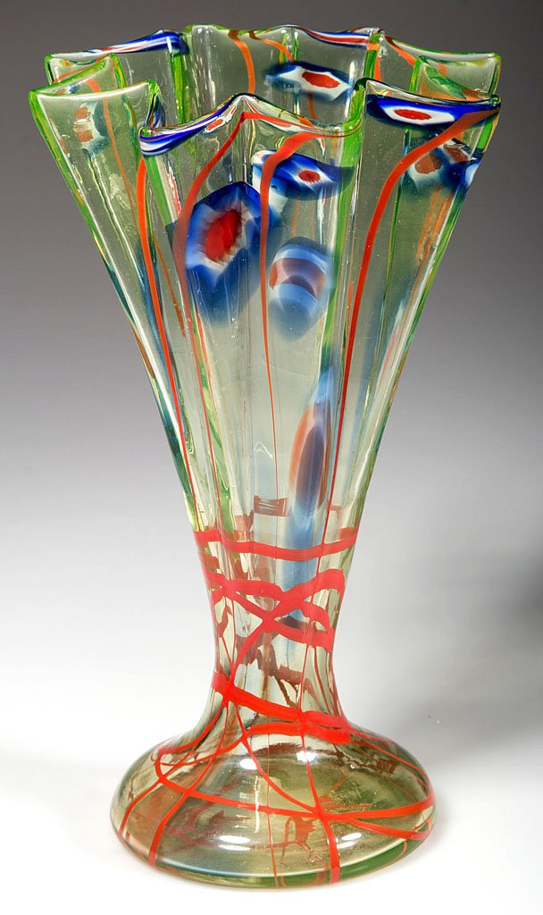 ART DECO DECORATED GLASS VASE: ART DECO DECORATED GLASS VASE, vaseline (uranium) with red, white, and blue eye and trailed decorations, star-crimped rim, partially polished pontil mark. Czechoslovakia. Circa 1925. 8" H. Provenance: