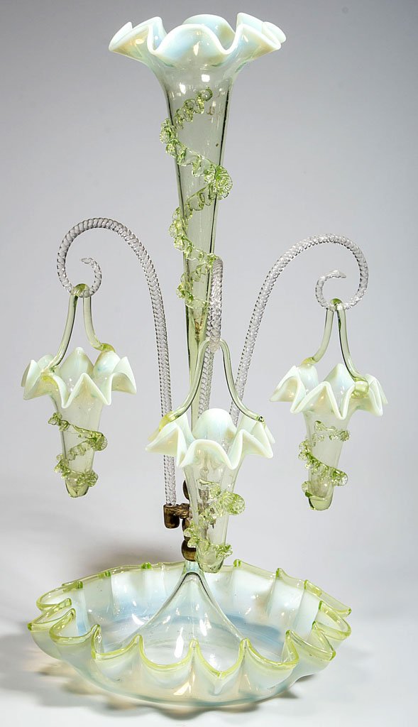 VICTORIAN GLASS EPERGNE: VICTORIAN GLASS EPERGNE, vaseline (uranium) opalescent, ruffled-rim bowl fitted with a central trumpet-form vase surrounded by three colorless Sheppard's crook arms each hung with a basket, applied ri
