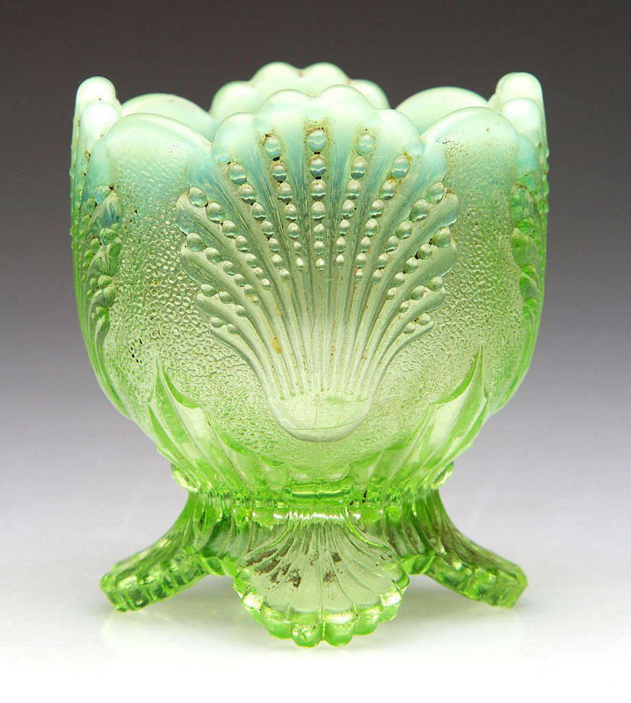 NEW YORK / SHELL TOOTHPICK HOLDER: NEW YORK / SHELL TOOTHPICK HOLDER, green opalescent. National Glass Co. Circa 1900-1910. 2 1/4" H.