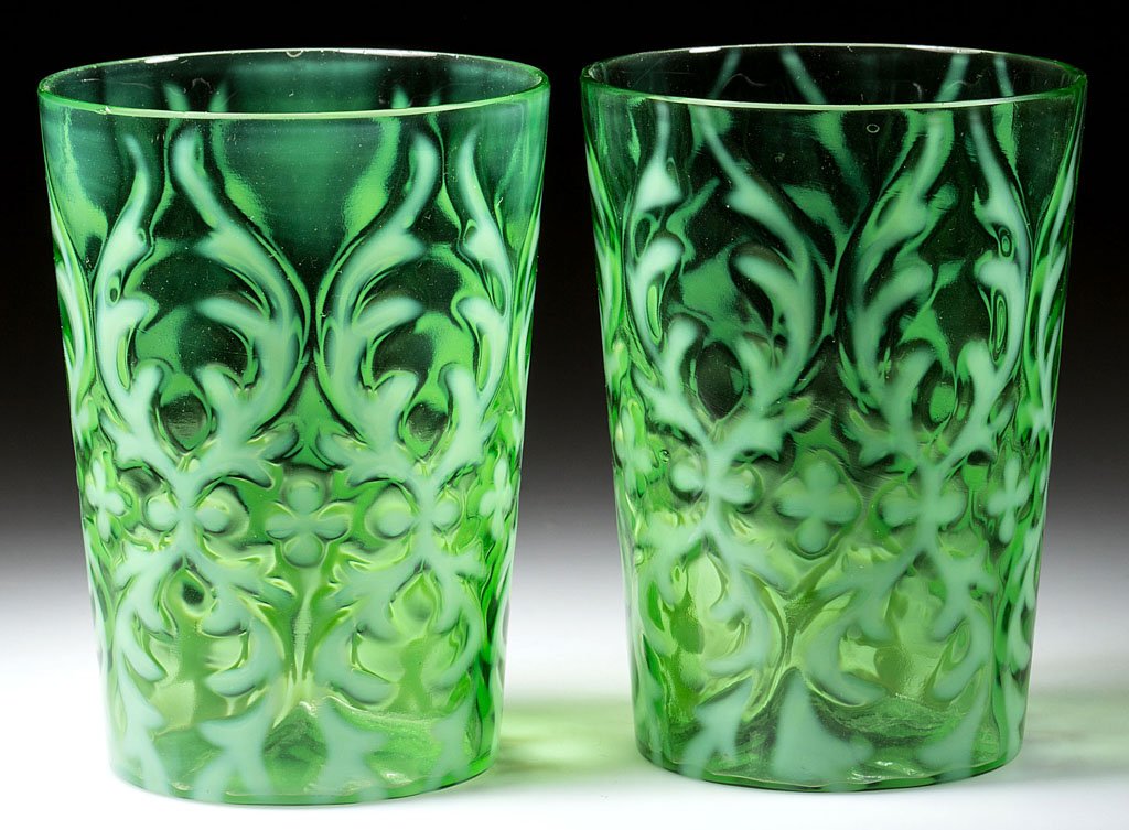 OPALINE BROCADE / SPANISH LACE PAIR OF TUMBLERS: OPALINE BROCADE / SPANISH LACE PAIR OF TUMBLERS, green opalescent, tapered form, factory polished rims. Northwood Glass Co. Pattern introduced 1899. 4" H. Provenance: From the collection of Larry & Di