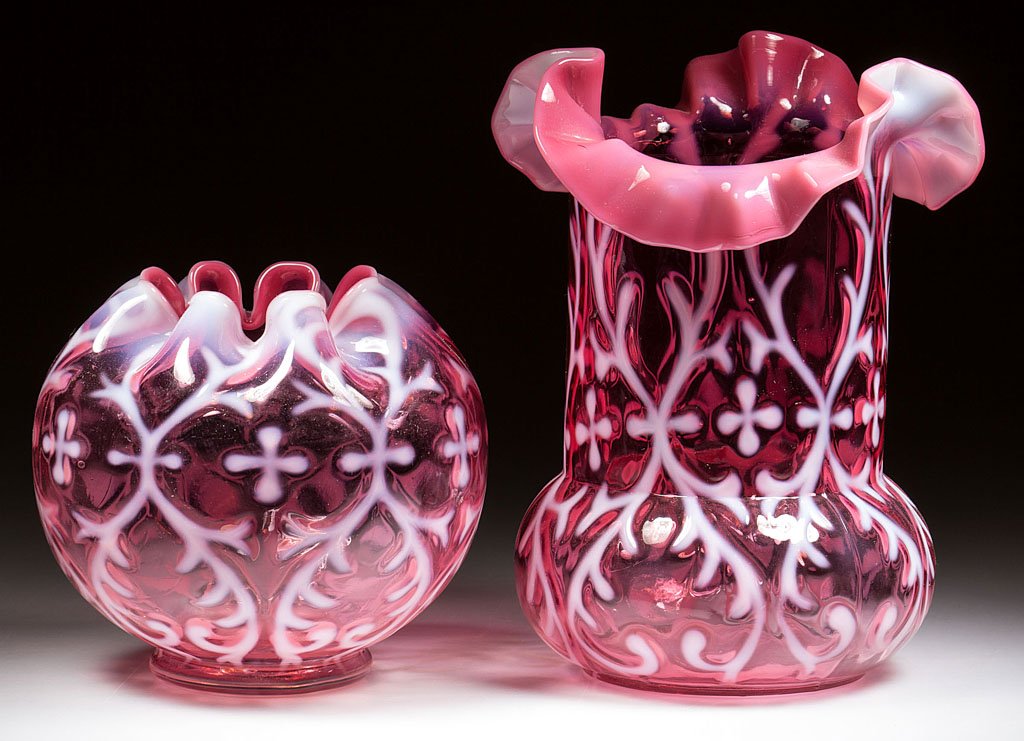 OPALINE BROCADE / SPANISH LACE TABLE ARTICLES, LOT OF: OPALINE BROCADE / SPANISH LACE TABLE ARTICLES, LOT OF TWO, cranberry opalescent, comprising a celery vase with crimped rim and a rose bowl. Northwood Glass Co. Pattern introduced 1899. 6" and 4" HOA.