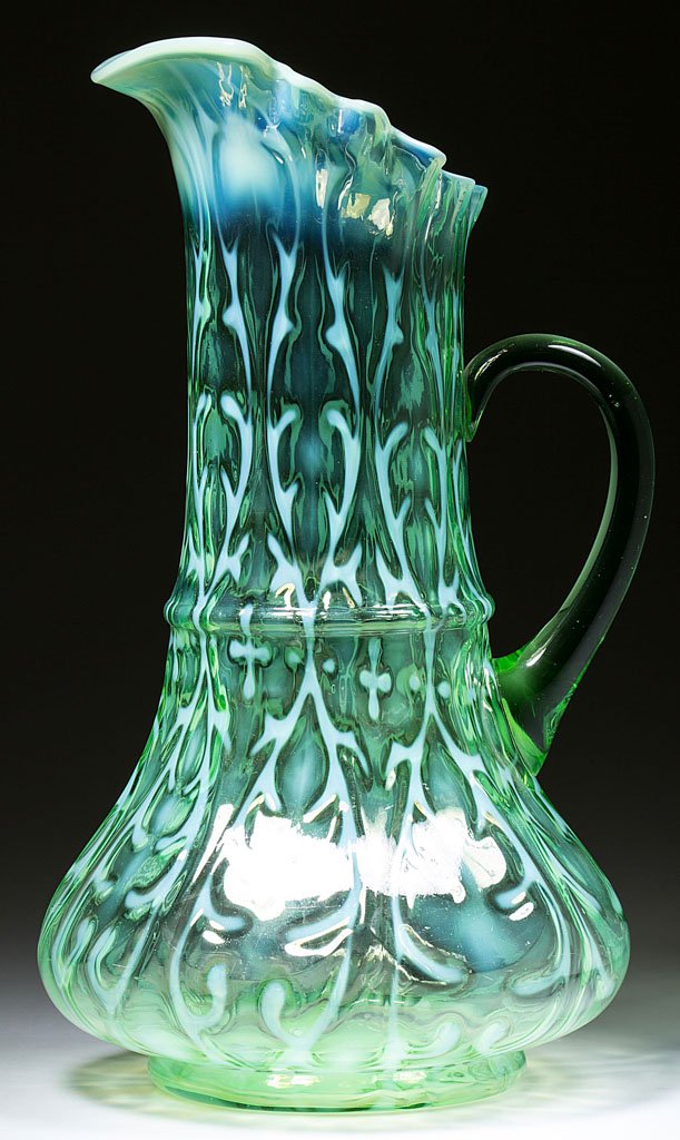 OPALINE BROCADE / SPANISH LACE - RIBBON TIE MOLD: OPALINE BROCADE / SPANISH LACE - RIBBON TIE MOLD TANKARD WATER PITCHER, green opalescent, circular crimped rim, transparent green applied handle. Northwood Glass Co. Pattern introduced 1899. 12 1/4" H