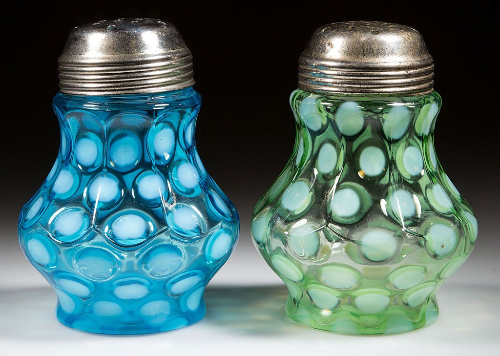 COINSPOT - NINE-PANEL MOLD SUGAR SHAKERS, LOT OF TWO: COINSPOT - NINE-PANEL MOLD SUGAR SHAKERS, LOT OF TWO, blue and green opalescent, period and a non-period lid. Northwood Glass Co. Pattern introduced 1894. 4 3/4" HOA.