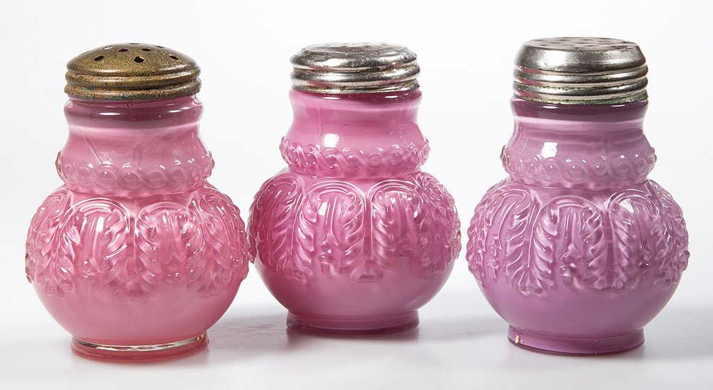 NORTHWOOD NO. 263 / LEAF UMBRELLA SALT SHAKERS, LOT OF: NORTHWOOD NO. 263 / LEAF UMBRELLA SALT SHAKERS, LOT OF THREE, Rose du Barry/cased pink, period lids. Northwood Glass Co. Pattern introduced 1889. 3" to 3 1/8" HOA. Provenance: From a New England priva