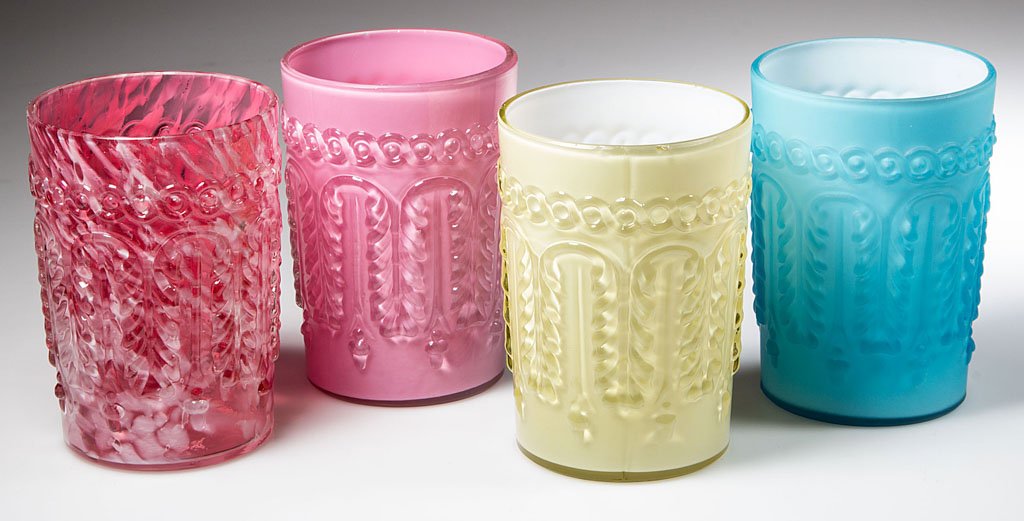 NORTHWOOD NO. 263 / LEAF UMBRELLA TUMBLERS, LOT OF FOUR: NORTHWOOD NO. 263 / LEAF UMBRELLA TUMBLERS, LOT OF FOUR, comprising Rose Agate/cranberry with opal splatter, Turquoise/cased blue satin, Topaz/cased lemon glossy (uranium), and Rose du Berry/cased pin