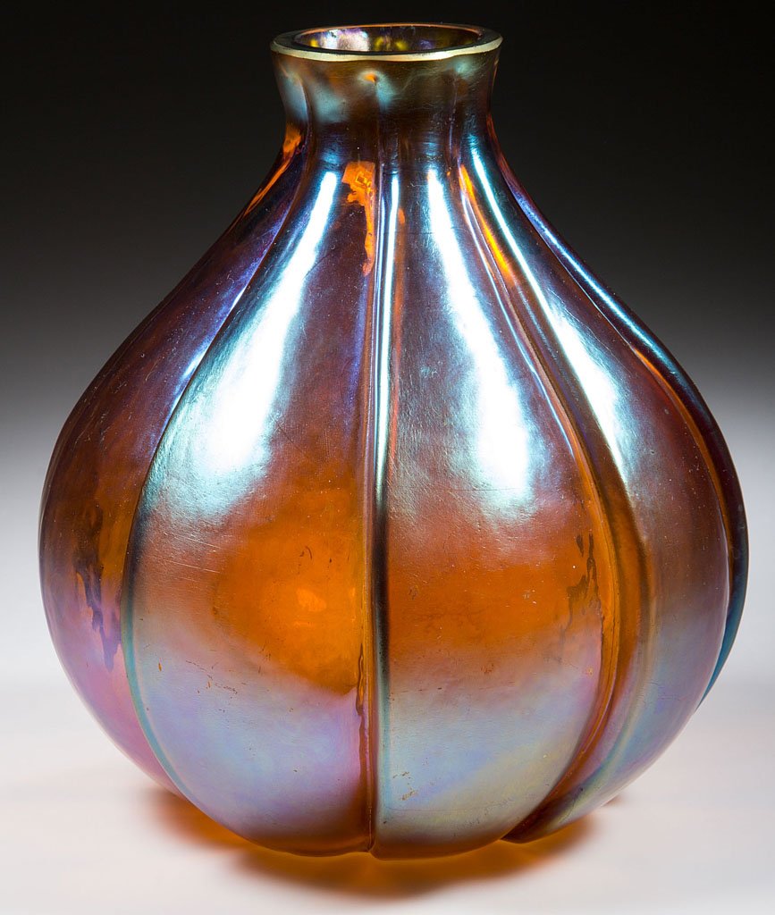 MOLDED ART GLASS VASE: MOLDED ART GLASS VASE, gold iridescent, gourd form with heavy overlapping lobes, factory polished rim, base, and pontil mark. Possibly Loetz, Steuben, or Quezal. First quarter 20th century. 6 1/2" H.