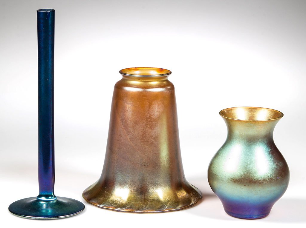 ASSORTED ART GLASS ARTICLES, LOT OF THREE: ASSORTED ART GLASS ARTICLES, LOT OF THREE, comprising a signed Steuben blue Aurene shape 2556 bud vase; an unsigned gold iridescent rib-optic lamp shade, possibly Steuben; and an unsigned gold iridesc