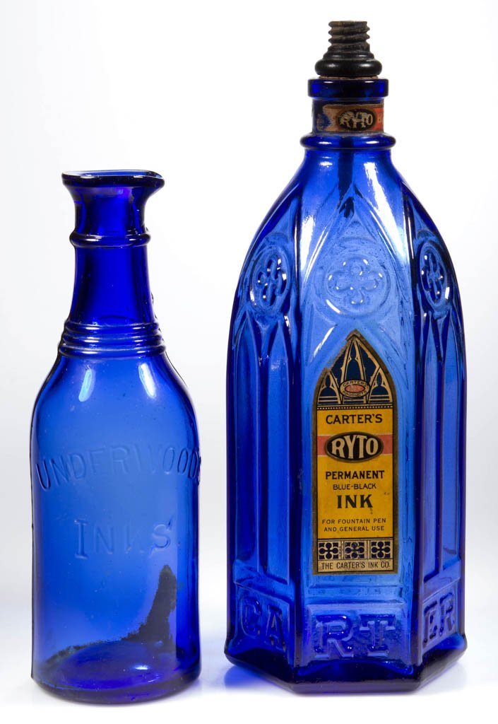 CARTER'S RYTO AND UNDERWOOD'S INK BOTTLES, LOT OF TWO: CARTER'S RYTO AND UNDERWOOD'S INK BOTTLES, LOT OF TWO, cobalt blue, master / bulk size, "Carter's" example in hexagonal form, embossed cathedral motif with "CA / RT / ER / CA / RT / ER", with paper la