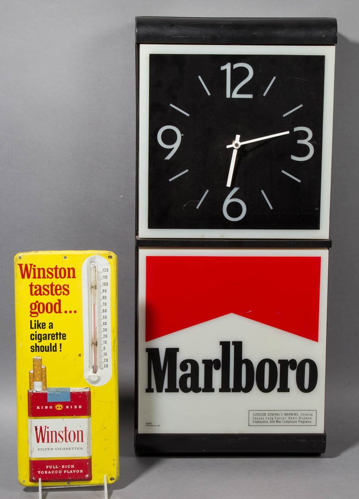 ASSORTED CIGARETTE ADVERTISING ITEMS, LOT OF TWO: ASSORTED CIGARETTE ADVERTISING ITEMS, LOT OF TWO, comprising a tin Winston thermometer with original tube and a plastic Marlboro electric/battery lighted clock. Second half 20th century. 13 1/2" and 2