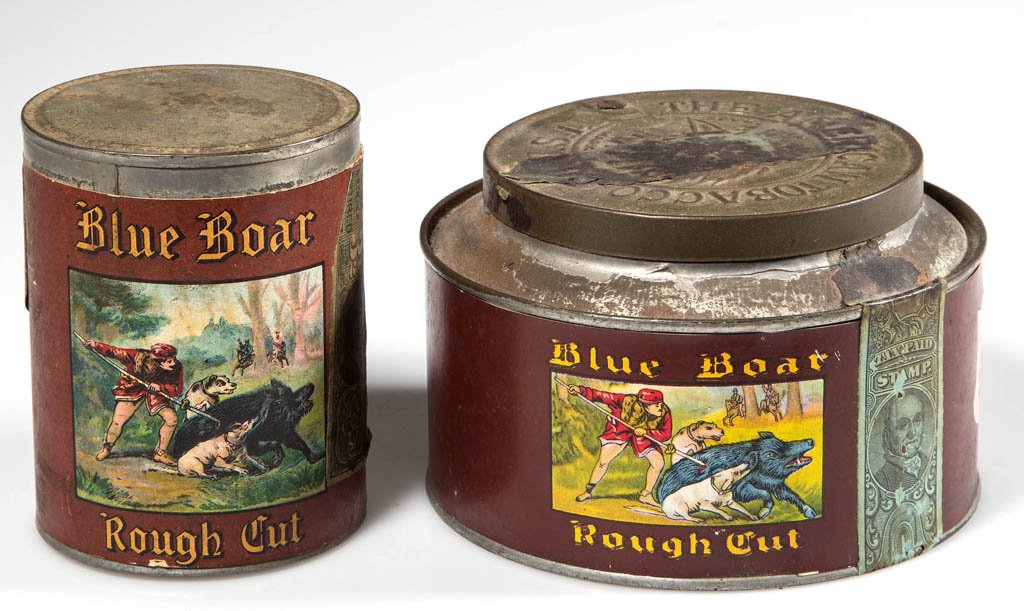 BLUE BOAR TOBACCO ADVERTISING TINS, LOT OF TWO: BLUE BOAR TOBACCO ADVERTISING TINS, LOT OF TWO, each with paper label and tax stamp, comprising a low canister and an unopened can. First half 20th century. 3" and 3 1/2" H. Provenance: Property of a 