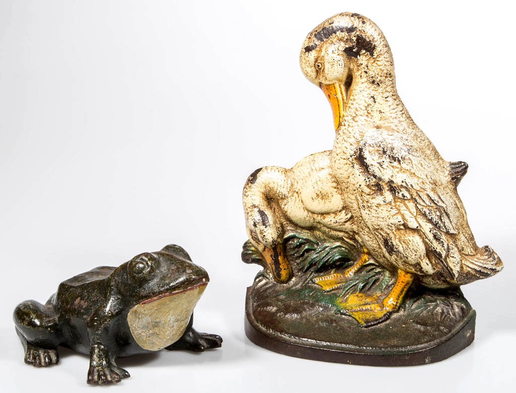 CAST-IRON DOORSTOPS, LOT OF TWO: CAST-IRON DOORSTOPS, LOT OF TWO, comprising a full-figure, solid-body Frog, and a flat-back, hollow-body Ducks, each with original paint. Probably Hubley. First half 20th century. 4 3/8" H, 8 3/4" L, 