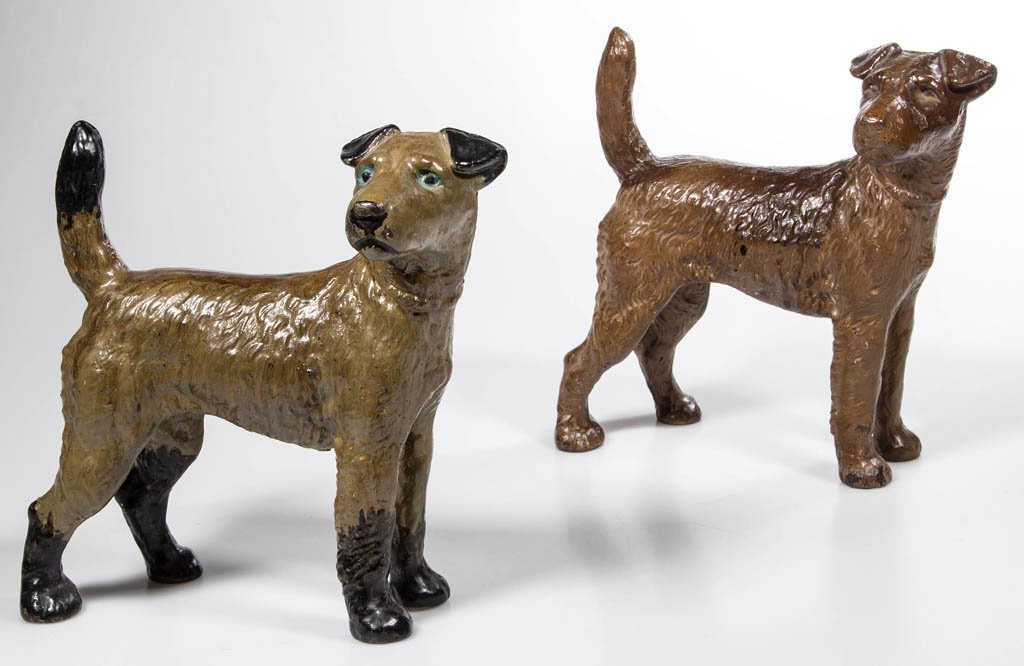 FOX TERRIER - FACING RIGHT CAST-IRON DOORSTOPS, LOT OF: FOX TERRIER - FACING RIGHT CAST-IRON DOORSTOPS, LOT OF TWO, each full, hollow figure, with excellent original paint. Hubley or National Foundry. First half 20th century. 8 1/2" H, 8 1/2" L. Provenance
