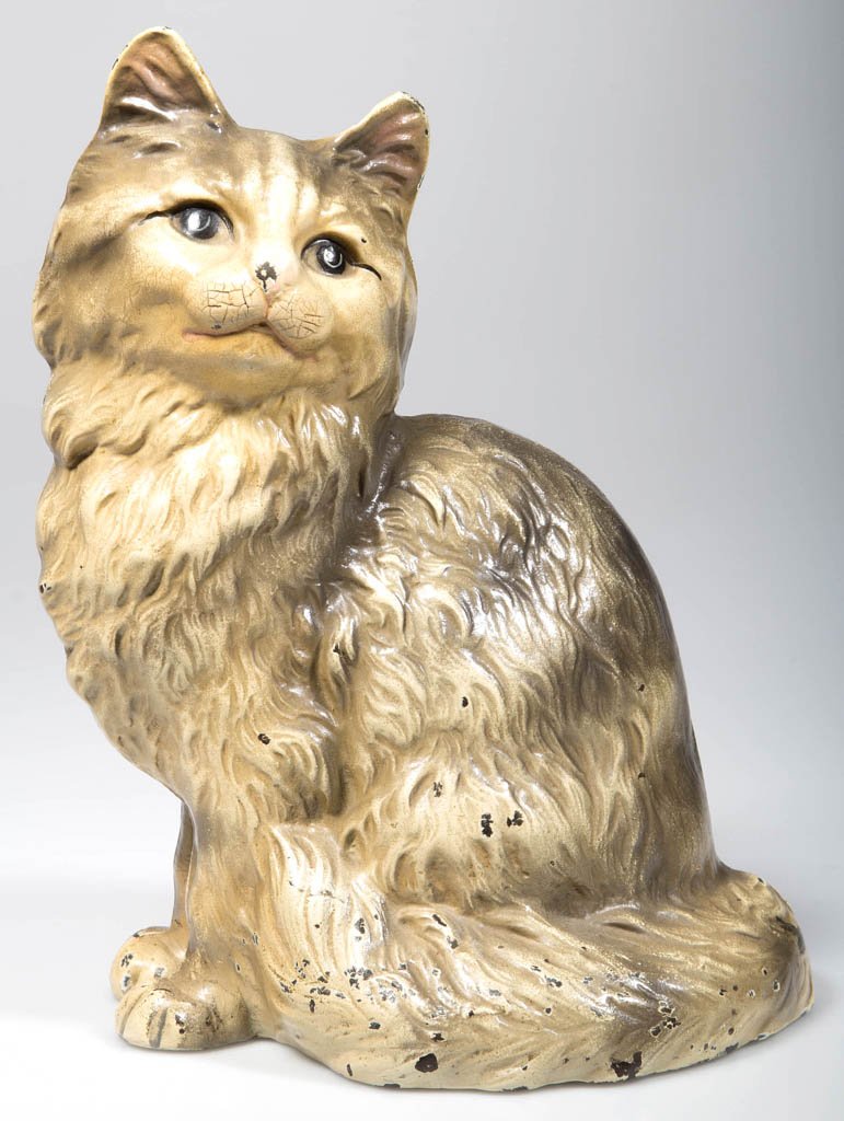 SITTING PERSIAN CAT CAST-IRON DOORSTOP: SITTING PERSIAN CAT CAST-IRON DOORSTOP, full, hollow figure, interior stamped "HUBLEY", numbered "302" and partial original label, with excellent original paint. Hubley. First half 20th century. 9" H,