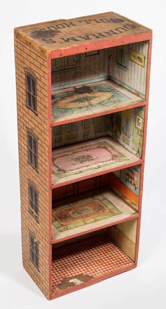 DUNHAM'S COCOANUT DOLL HOUSE: DUNHAM'S COCOANUT DOLL HOUSE, four story wooden box with lithographed paper interiors, lettering on each exterior end. Late 19th/early 20th century. 29" H, 12" W, 7" D. Provenance: Property of a Rocki