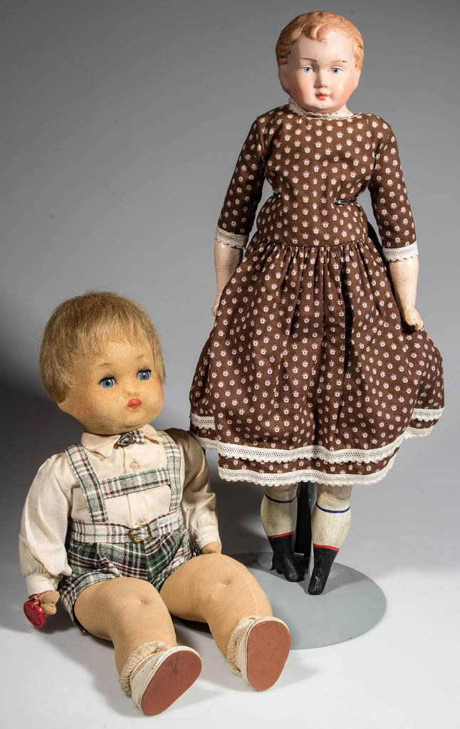 GERMAN PAPER MACHE/COMPOSITION CHILD DOLL: GERMAN PAPER MACHE/COMPOSITION CHILD DOLL, shoulder head, stamped "GERMANY", molded blond hair, painted eyes and eyebrows, cloth body with composition arms and legs, molded and painted boots, Vintage