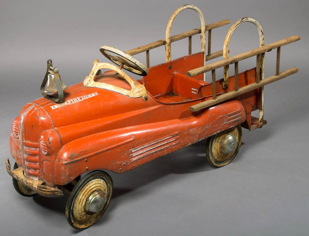 MURRAY "CITY FIRE DEPT" PRESSED STEEL PEDAL CAR: MURRAY "CITY FIRE DEPT" PRESSED STEEL PEDAL CAR, with bell and original wooden ladders. Circa 1950. 41" L. Provenance: From the collection of Janet and the late Michael J. Parmer, Waynesboro, VA.