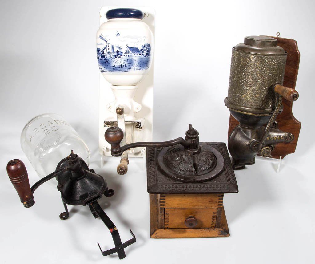 ASSORTED DOMESTIC COFFEE GRINDERS, LOT OF FOUR: ASSORTED DOMESTIC COFFEE GRINDERS, LOT OF FOUR, comprising a wood and cast-iron box style, and three wall-mount examples. Fourth quarter 19th/mid 20th century. Largest 15 1/2" H. Provenance: From the 