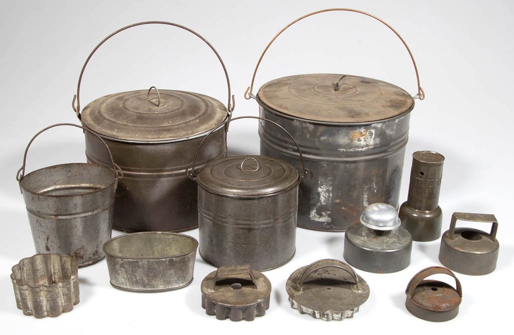 ASSORTED SHEET IRON KITCHEN AND DOMESTIC ARTICLES, LOT: ASSORTED SHEET IRON KITCHEN AND DOMESTIC ARTICLES, LOT OF 12, comprising seven various cookie/biscuit cutters including a Rumford example, three lunch buckets with covers and bail handles, a small buc