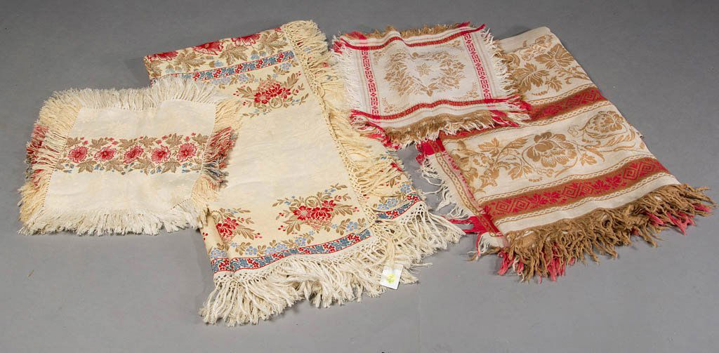 LINEN DAMASK TABLECLOTH AND NAPKIN SETS, LOT OF TWO: LINEN DAMASK TABLECLOTH AND NAPKIN SETS, LOT OF TWO, comprising a seven-piece set with floral pattern, and an assembled 11-piece set with floral and snowflake pattern, including ten matching napkins a