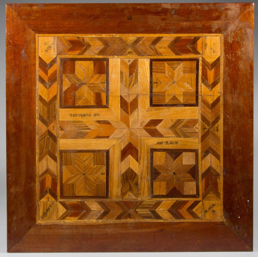 AMERICAN INLAID GAME BOARD: AMERICAN INLAID GAME BOARD, a marquetry inlaid example with playing surface in a framed border of cherry. Old varnished surface. First quarter 20th century. 21 1/2" SQ object. Provenance: Property of 