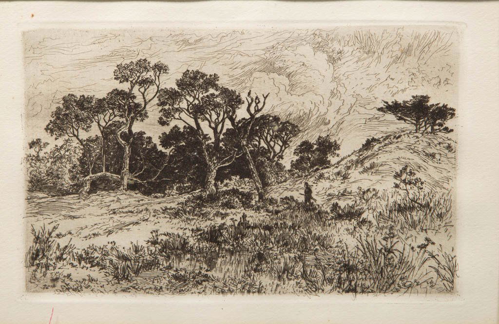 THOMAS MORAN (AMERICAN, 1837-1926) ETCHING: THOMAS MORAN (AMERICAN, 1837-1926) ETCHING, a fine, crisp impression on paper of a hunter in a wooded landscape, "Hunting Berkshires". Monogrammed lower left. Matted under glass in a black frame with