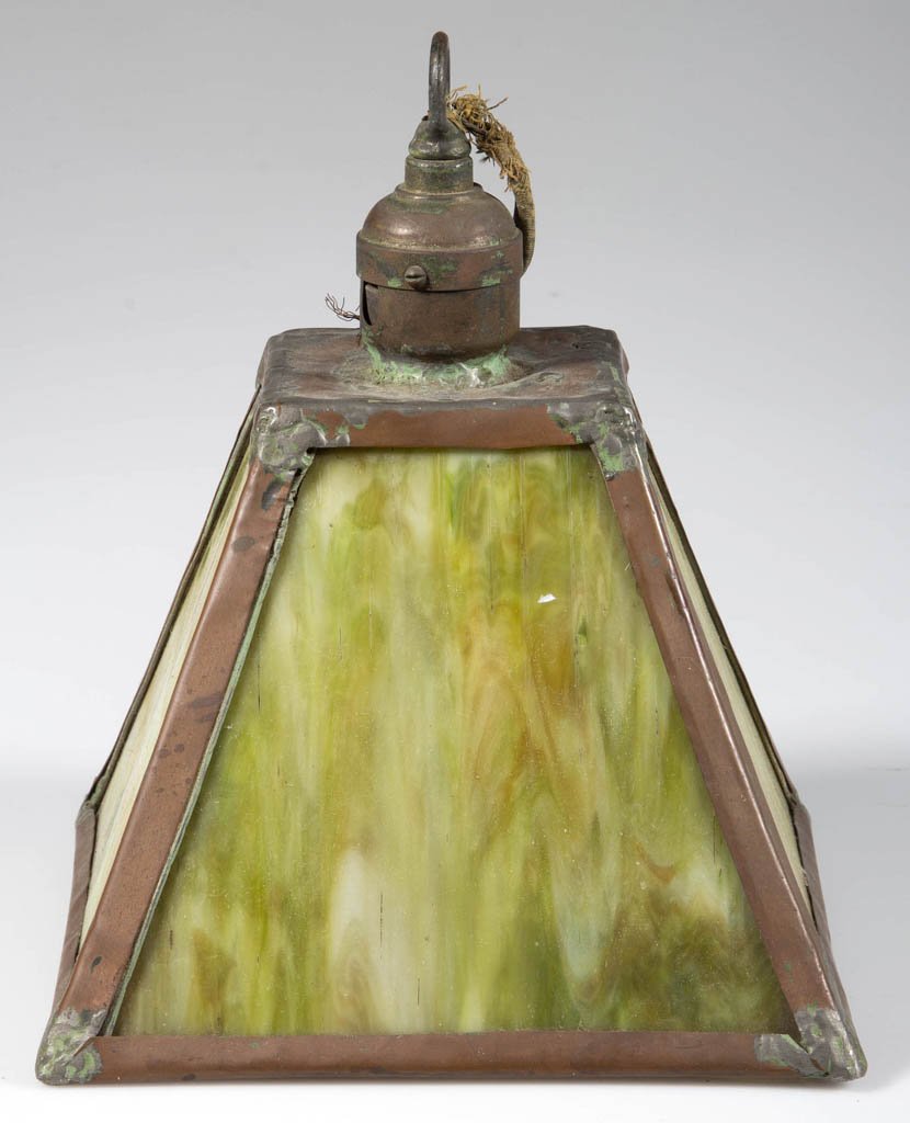 ARTS AND CRAFTS SLAG-GLASS HANGING LIGHT: ARTS AND CRAFTS SLAG-GLASS HANGING LIGHT, copper frame set with four panels, loop at top for suspension. First quarter 20th century. 8" H, 7 1/4" SQ.