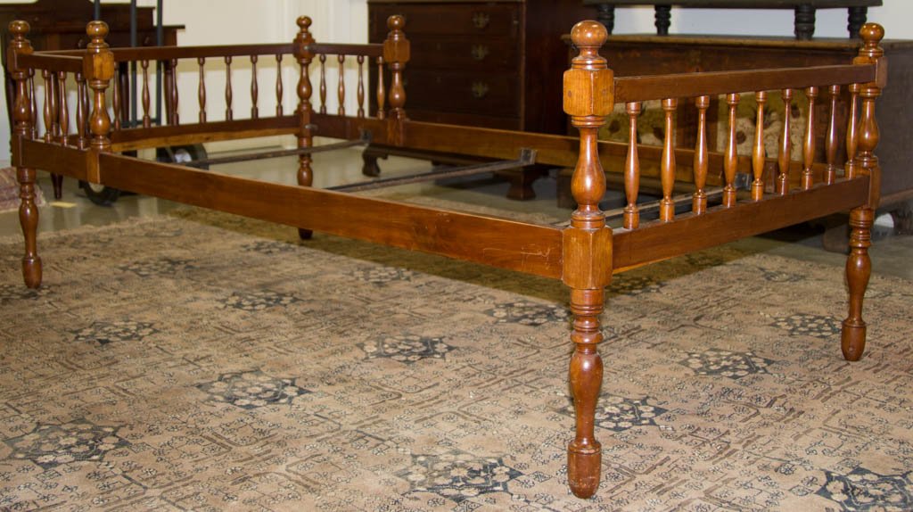 AMERICAN, POSSIBLY KENTUCKY, FEDERAL CHERRY DAYBED: AMERICAN, POSSIBLY KENTUCKY, FEDERAL CHERRY DAYBED, with vigorous turnings and an old refinished surface with mellow color. Now fitted with modern metal bars for mattress support. Mid 19th century. 79